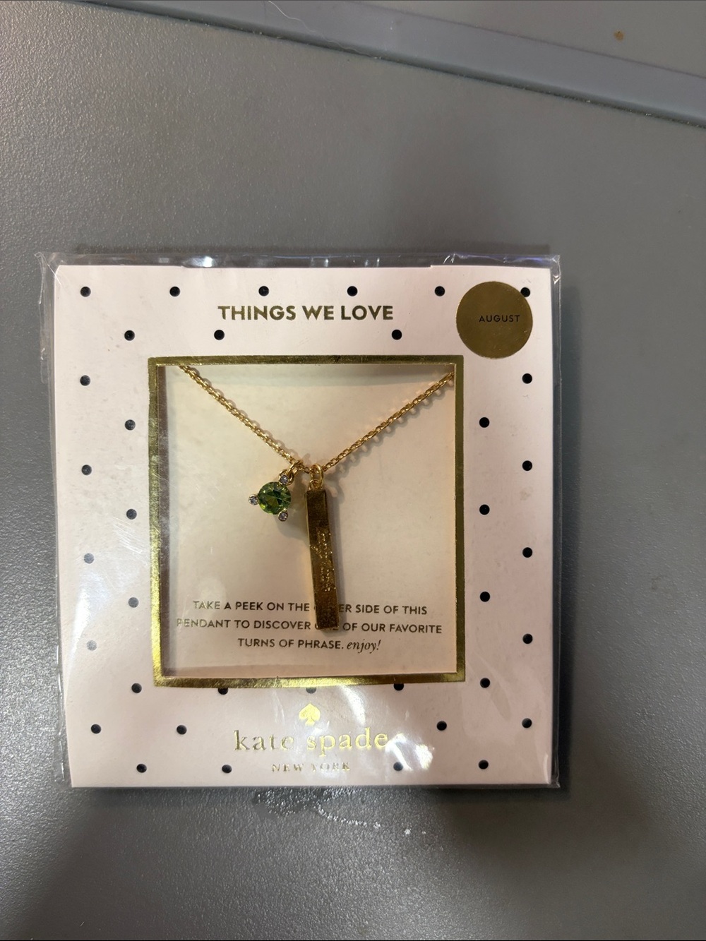 kate spade gold-tone bar pendant necklace with green charm